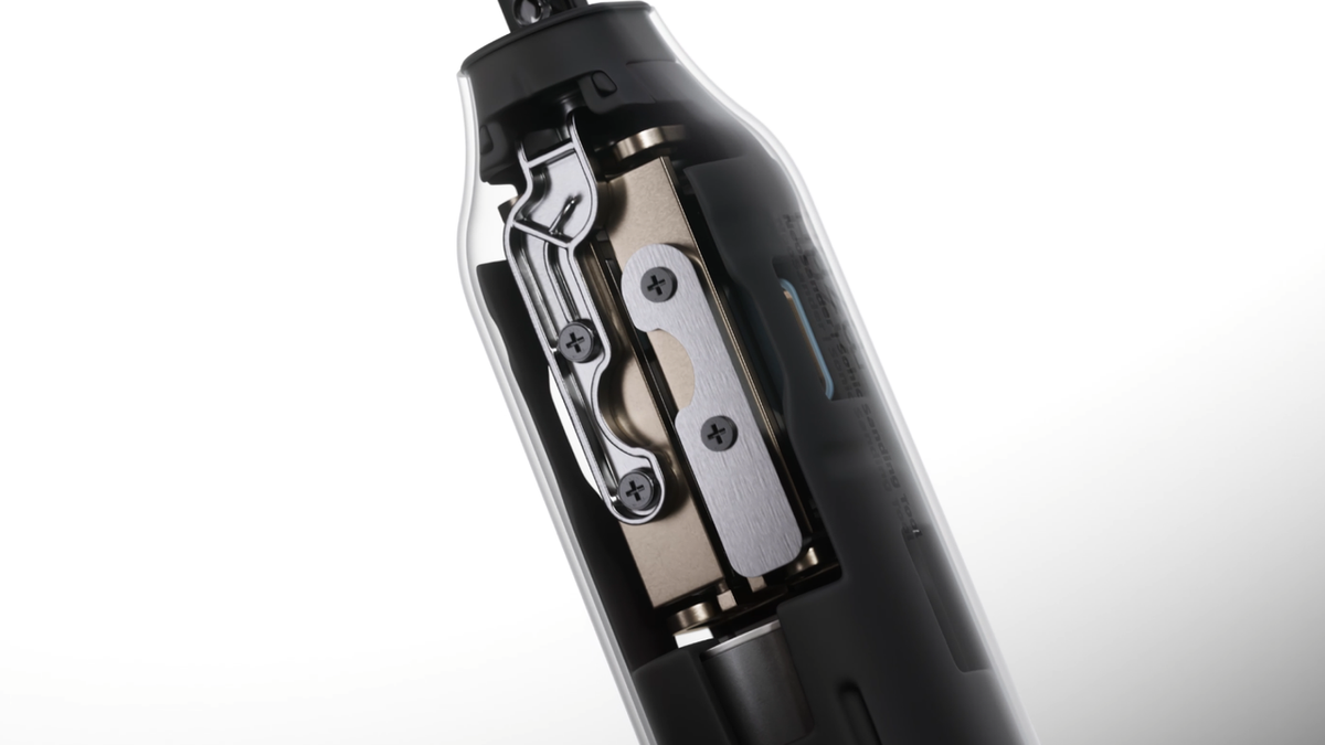 Cutaway view of the NeoSander showing the internal magnesium-aluminum connecting rod and stainless steel counterweight system designed to eliminate vibration.	
